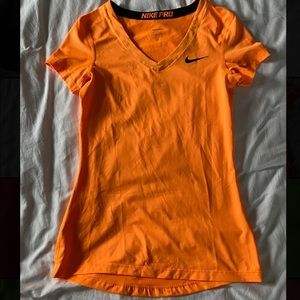 Orange Nike top
